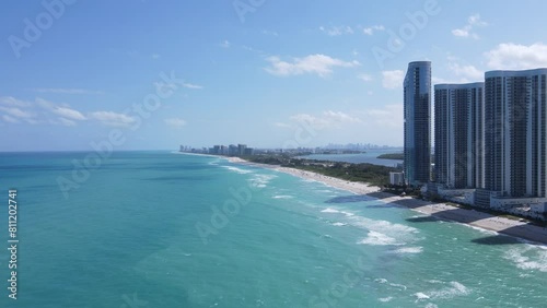 Aerial view of seafront urban buildings and Haulover Beach in Sunny Isles Beach city, Florida, USA photo