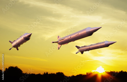 Missiles fly to the target. Missiles against the sunset. Missile defense. 3d-rendering