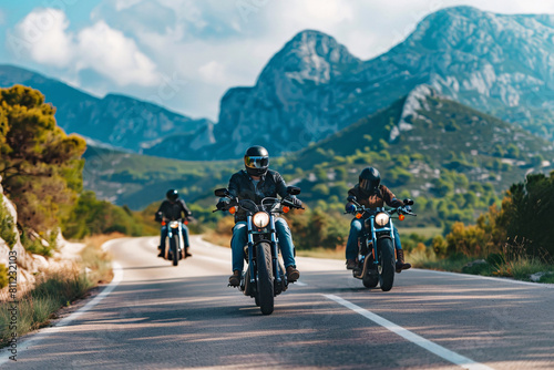 Group of motorcycle riders in black clothes on the road
