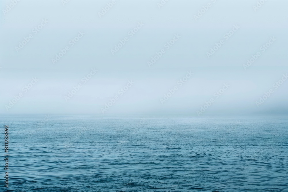 Tranquil Blue Sea Landscape with Foggy Background. Perfect Image for Nature Lovers and Ocean