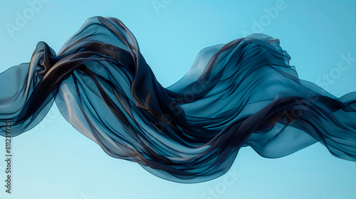 Black and smooth fabric floating in the air, behind a blue sky background. Ethereal Elegance