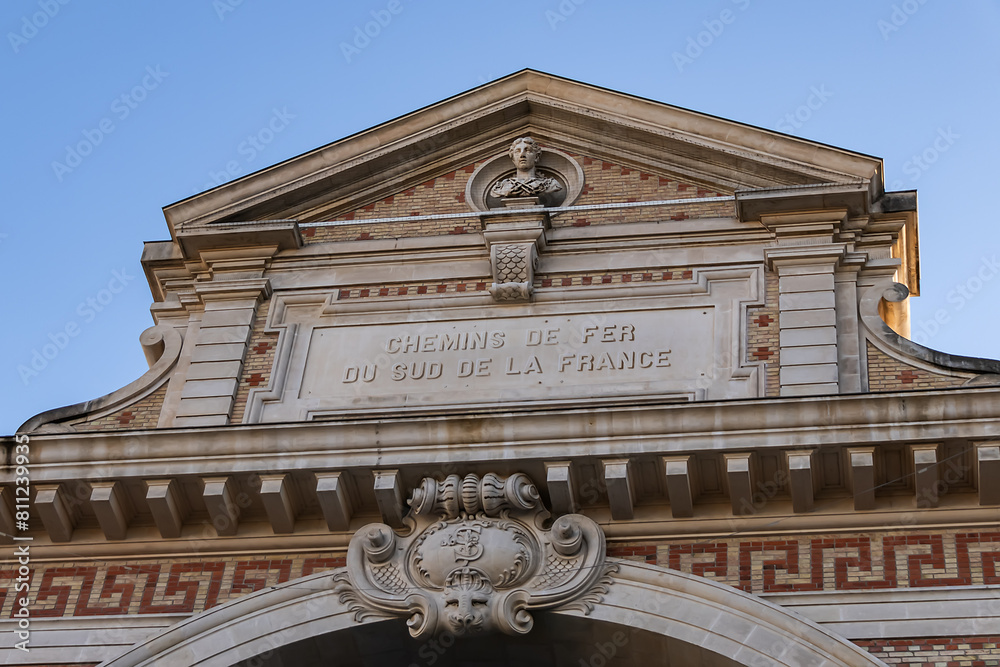 Fototapeta premium Architectural fragments of Gare du Sud (South Station, 1892), formerly a historic railway station, now a city library and food court. Nice, France.