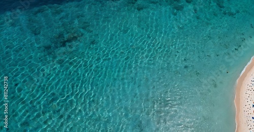 Blue ocean water shining in summer sun. Summer background