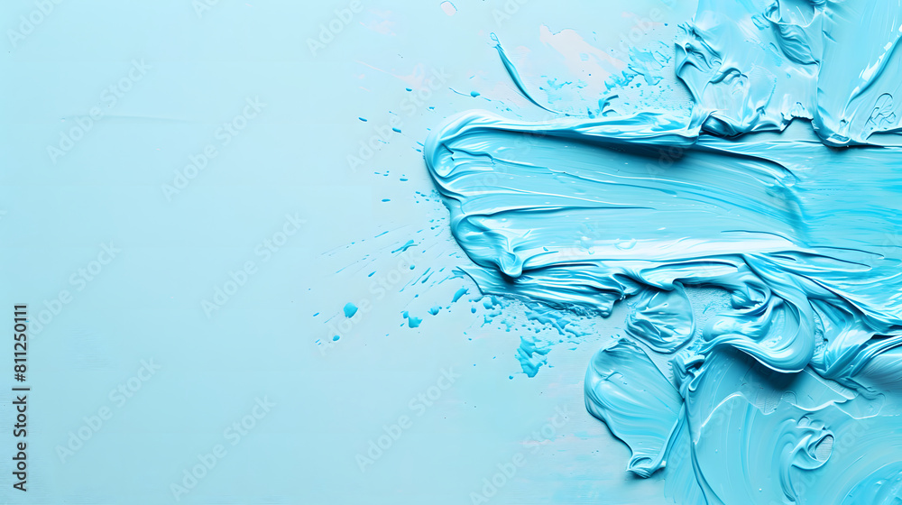 Obraz premium Vivid paint spills cascade onto a light blue backdrop, leaving ample space for text.