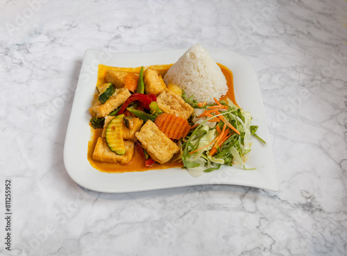 
Thai curry sauce with tofu rice and vegetables, Asian food