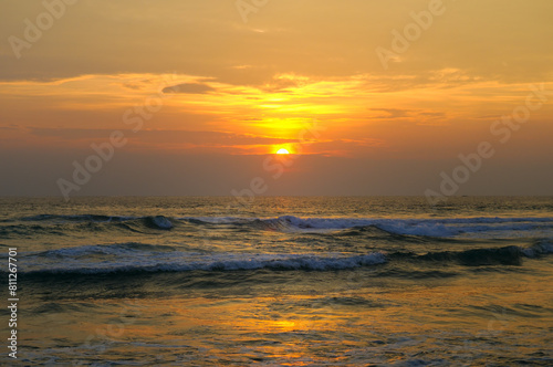 Panoramic beach landscape and golden sunset sky