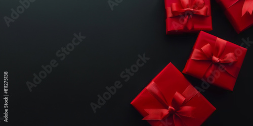 red gift box on black background