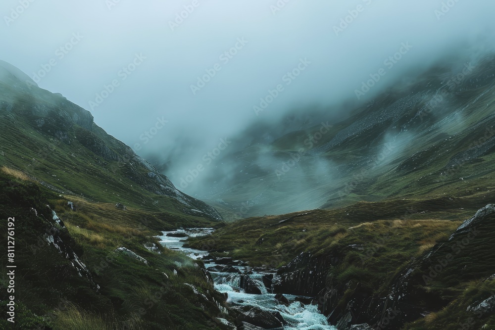 A stream winds its way through a vibrant green valley surrounded by misty mountains, A misty mountain range shrouded in fog with a gentle stream running through the valley