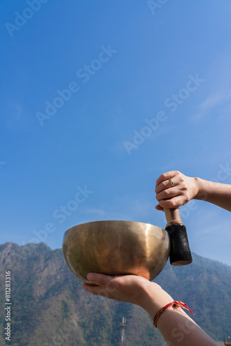 Tibetan singing bowl with the Himalayas in the background.