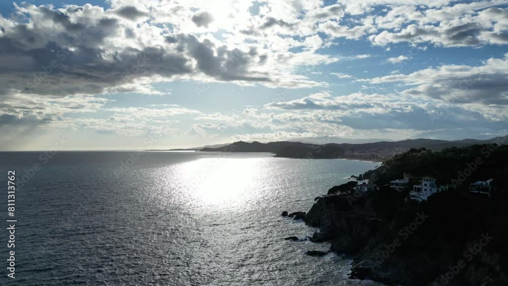 Beautiful cloudy sunset aerial view of sea horizon, mountains and city on the Mediterranean coastline, 4K Beautiful cloudy sunset aerial view of sea horizon, mountains and city on the Mediterranean coastline, 4K