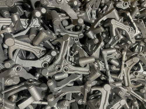 lot of iron die cast parts placed on mass, automotive parts mass production, mass production of iron casting parts, cast iron parts mass production