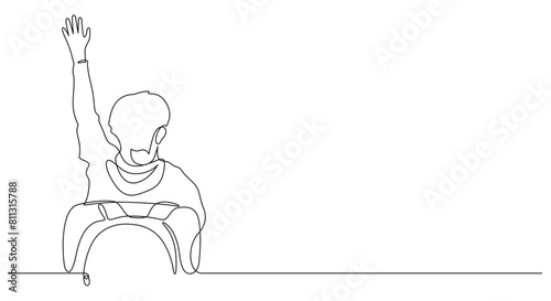 back of school children boy raising hand in classroom