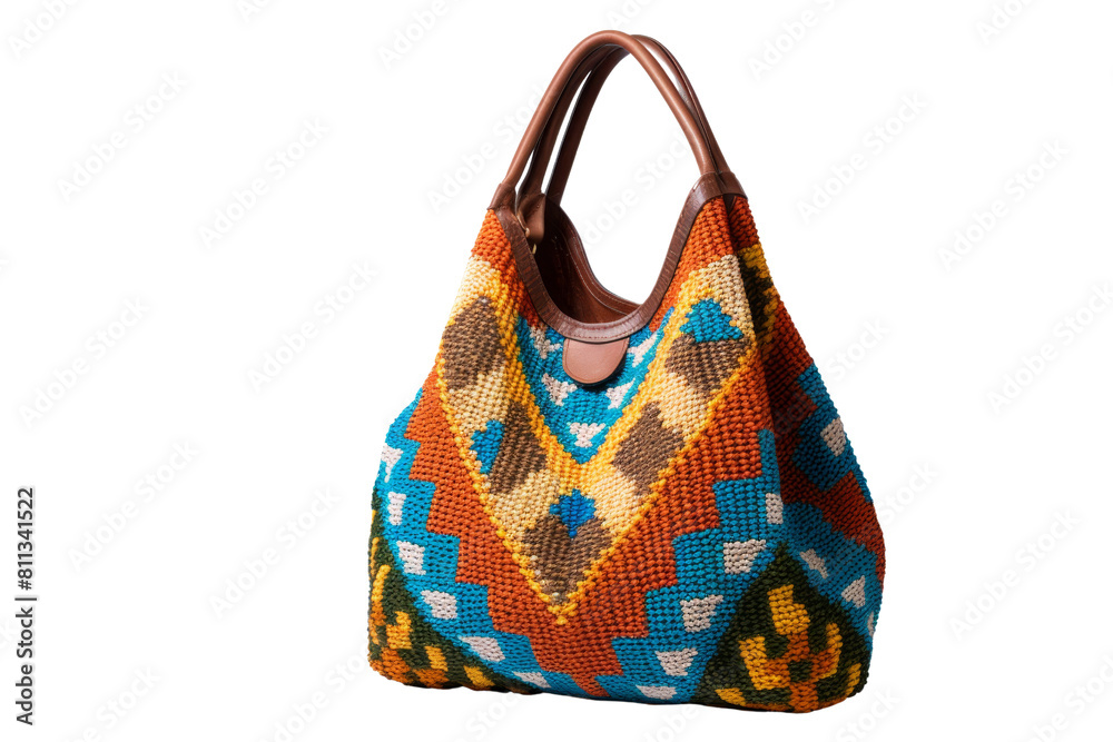 A colorful purse with a brown strap. The purse is made of a variety of colors and has a unique design