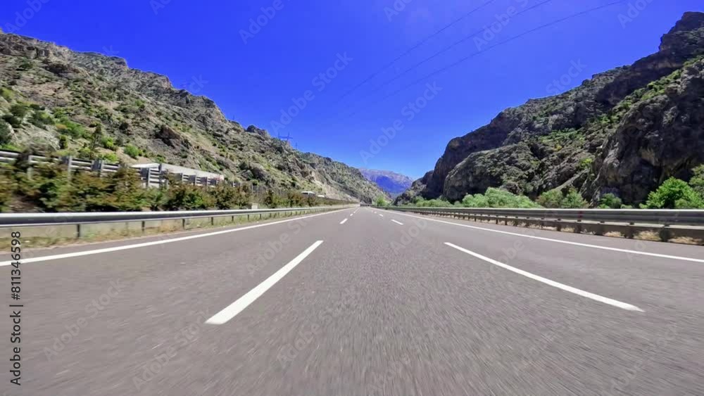 Experience the breathtaking views as we navigate a winding mountain road surrounded by towering trees and rolling hills Experience the breathtaking views as we navigate a winding mountain road surrounded by towering trees and rolling hills
