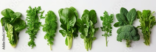 Assortment of fresh leafy greens on White Background