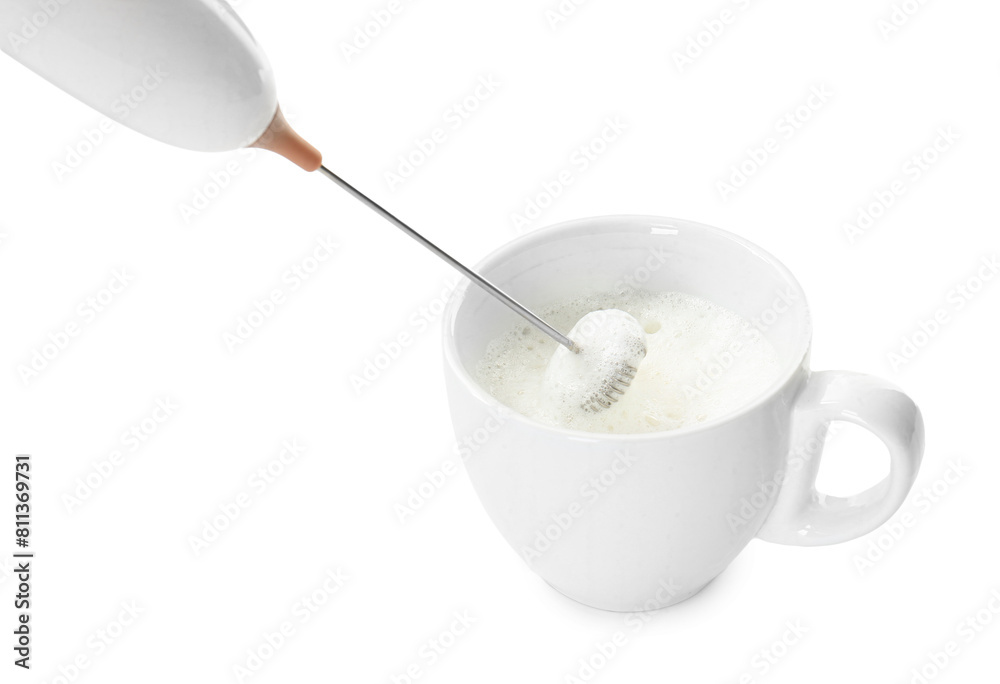 Whisking milk in cup with mini mixer (frother wand) isolated on white, closeup Whisking milk in cup with mini mixer (frother wand) isolated on white, closeup