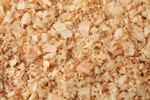 Pile of natural sawdust as background, top view