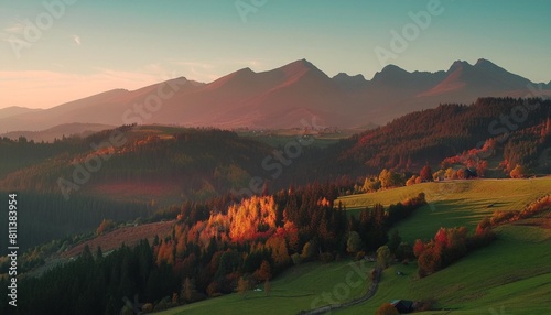 colorful autumn near the tatras peaks and hills bathed in the light of the setting sun