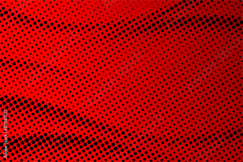 Dotted halftone pattern on red black background. Abstract retro pop art texture for presentation, wallpaper, flyer, banner, poster, banner, brochure and more.