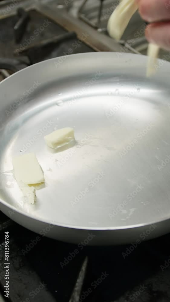 The Butter Melting Inside A Frying Pan The Butter Melting Inside A Frying Pan