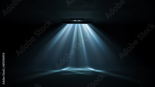 Cinematic light effect coming from a cinema projector in a dark isolated screening room cinema environment