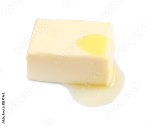 Piece of melting butter on white background
