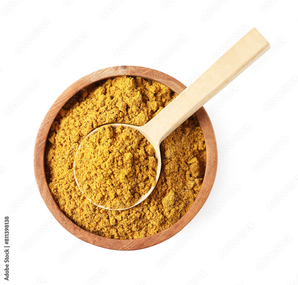 Dry curry powder in bowl and spoon isolated on white, top view