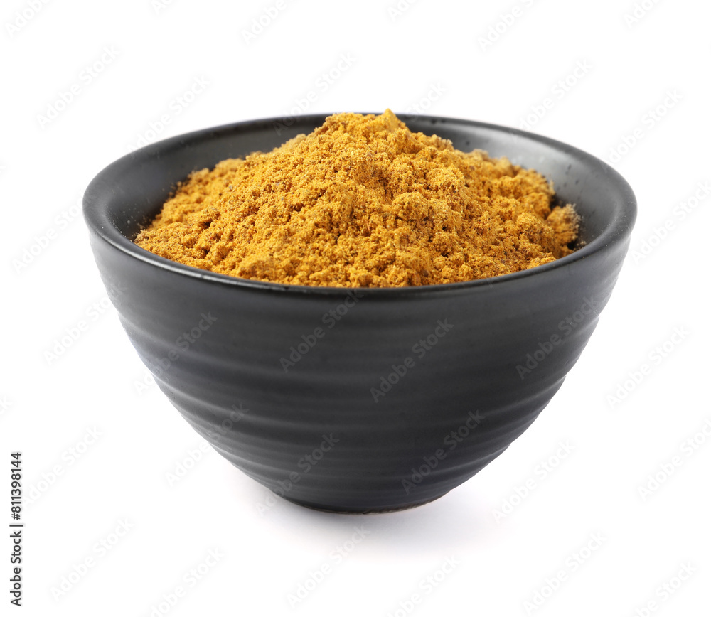 Dry curry powder in bowl isolated on white Dry curry powder in bowl isolated on white