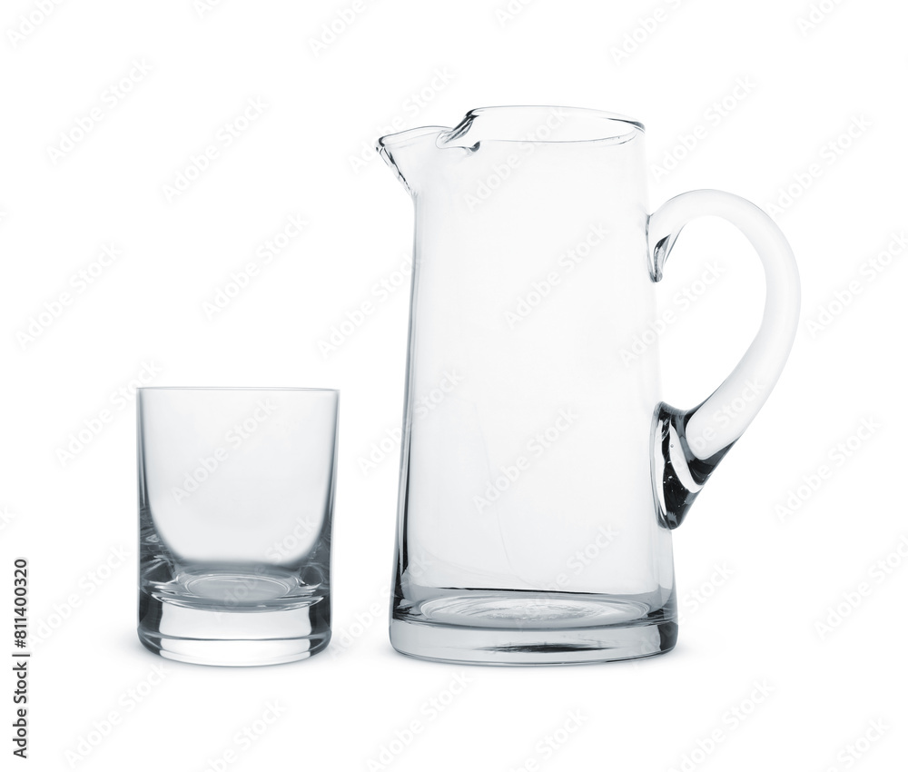 Empty glass and jug isolated on white Empty glass and jug isolated on white