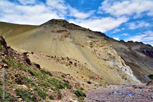 View of the rocky gorge taken from the hiking trail leading from the mountain pass Kongmaru La (5250 m) to the Chogdo village ("Markha Trek", Ladakh region, northwest India)