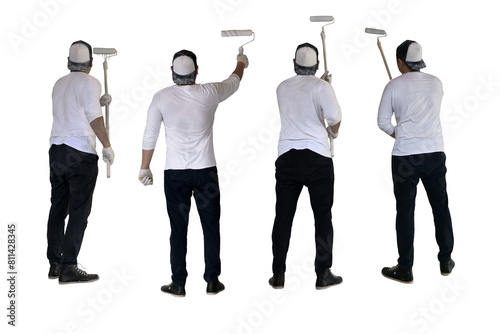 Asian male painter painting wall with roller brush, cut out isolated