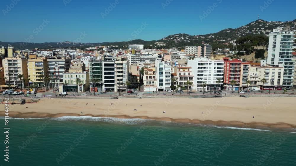 Panoramic aerial view of the city Lloret de Mar in Spain with its coastline, beach and houses on sunny day, 4K Panoramic aerial view of the city Lloret de Mar in Spain with its coastline, beach and houses on sunny day, 4K