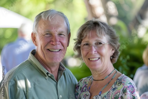 happy senior couple smiling at outdoor family gathering portrait photography