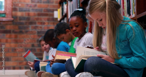School library hosts diverse group of students, all reading books