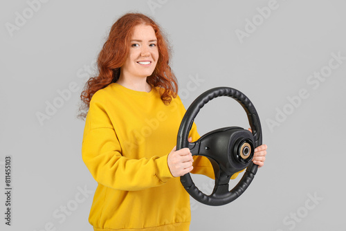 Pretty young woman with ste...