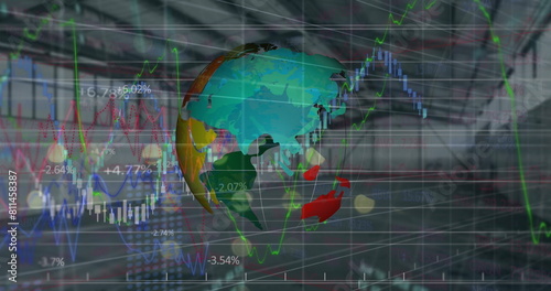 Image of globe and graphs and financial data over office space