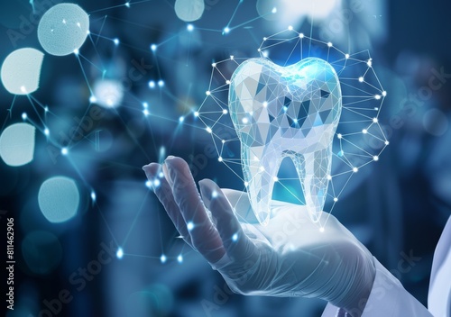 Dental doctor holding a tooth hologram in their hand with a digital line connection in a blue colored background, a professional medical concept of dental treatment.