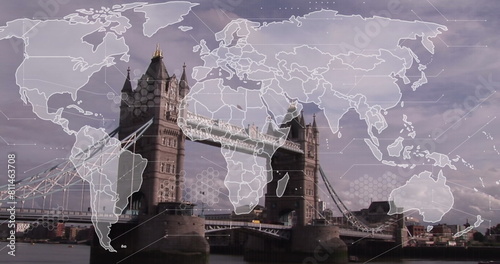 Image of world map and data processing against view of london bridge