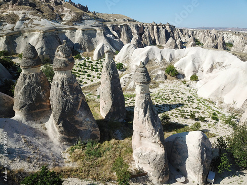 Aerial drone shot of the Fairy Chimneys over the landscape of Goreme, Cappadocia.
