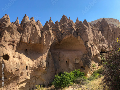 Aerial drone shot of the Fairy Chimneys over the landscape of Goreme, Cappadocia.