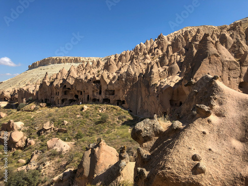 Aerial drone shot of the Fairy Chimneys over the landscape of Goreme, Cappadocia.