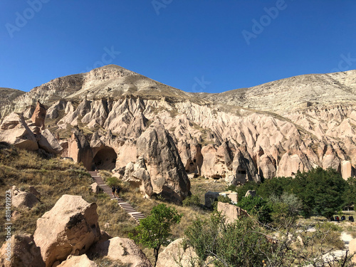 Aerial drone shot of the Fairy Chimneys over the landscape of Goreme, Cappadocia.