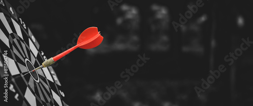 Photos Target bullseye or Bulls eye or dartboard has red dart arrow throw hitting the center of a shooting for financial business targeting planning growth and aim to winner goal of business win concept