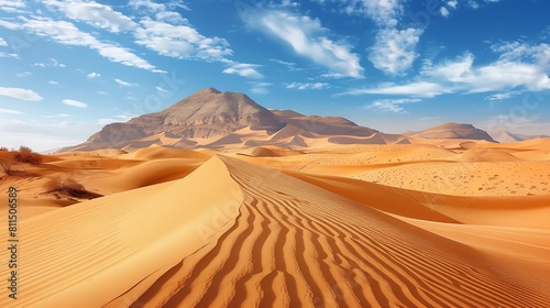 A majestic desert landscape with towering sand dunes and a clear blue sky  offering a dramatic nature wallpaper.