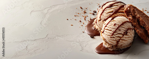 A single scoop of coffee ice cream with a chocolate drizzle and a slice of biscotti, positioned on the right side of the banner. Copyspace on the left. photo