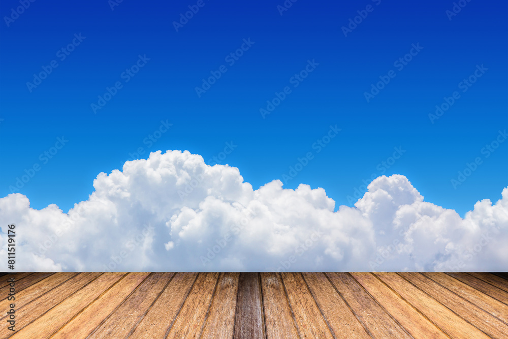Blue sky and clouds with wooden floor and space for add text above Blue sky and clouds with wooden floor and space for add text above