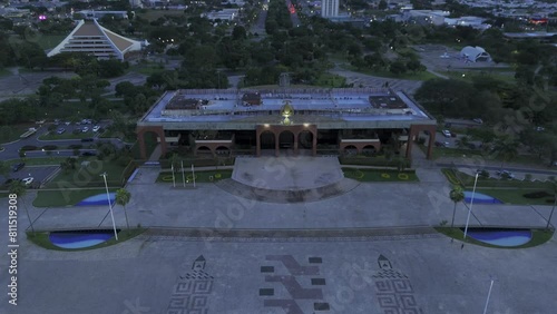 Drone slowly lowers in front of Palacio Araguaia Governador Jose Wilson Siqueira Campos after sunset photo