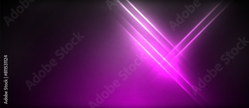 A vibrant purple light beam creates a stunning visual effect on a dark black background, resembling a magical lens flare