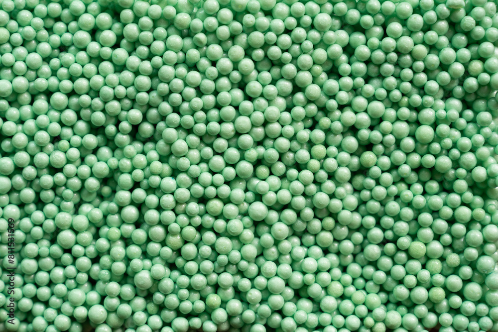 close up of green foam beads for the background close up of green foam beads for the background
