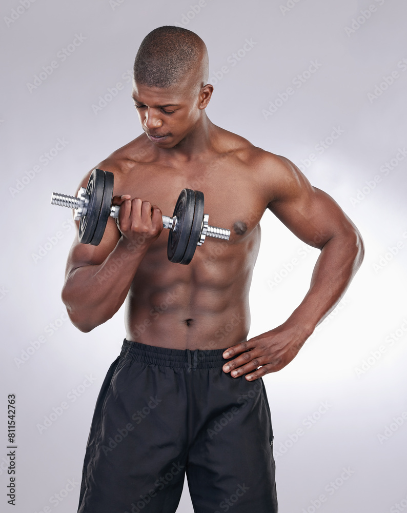 African man, dumbbell and exercise in studio with thinking, progress and development by white background. Person, bodybuilder and strong with workout, fitness and training for healthy body in gym African man, dumbbell and exercise in studio with thinking, progress and development by white background. Person, bodybuilder and strong with workout, fitness and training for healthy body in gym